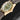 Side profile of the 18kt yellow gold Tudor Black Bay case showing the winding crown engraved with the Tudor rose