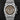 direct close-up studio front portrait of the 39mm stainless steel Audemars Piguet Royal Oak Chronograph 26300ST watch featuring a brown tapestry dial on a watch stand