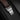 Close-up of the stainless steel folding deployment clasp and brown alligator leather strap on the Breitling Navitimer B01 46