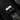 Close-up detail of the polished stainless steel tang buckle featuring the classic raised Breitling wings logo on a black strap
