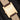 Rear studio view of the watch showing the solid 18k yellow gold caseback with official Cartier hallmarks and serial number engravings