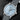 close-up studio shot focusing on the frosted ice-blue dial finish, polished white gold indices, and the pointer-date sub-dial at 6 o'clock