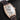 studio portrait focusing on the silver sunburst guilloché dial, applied rose gold relief numerals, and blued-steel hands