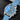 angled studio top-down view of the titanium IWC Chronograph 41 highlighting its sky blue rubber strap and the blue glare of its AR-coated sapphire crystal