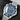 angled studio top-down view of the Omega Seamaster James Bond 60th Anniversary dive watch highlighting its blue dial and steel mesh bracelet
