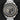direct close-up studio front portrait of the 42mm Omega Speedmaster Apollo 11 50th Anniversary 310.20.42.50.01.001 watch featuring a grey dial and Moonshine gold accents