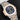 A studio portrait focusing on the embossed blue gradient dial, the 6 o'clock chronograph monocounter, and gold hands