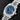ngled studio top-down view of the White Rolesor Rolex Datejust 36 highlighting its blue dial and fluted white gold bezel