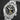 Angled view of a 44.8mm titanium Seiko Prospex LX Land watch showcasing the bidirectional rotating compass bezel and brushed three-link bracelet
