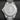 Solid screw-down titanium caseback displaying the iconic engraved scaphander diving helmet motif over a repeating hexagonal pattern