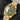 Right angled perspective of the 39mm Tudor Black Bay Fifty-Eight 18K highlighting the fully satin-finished solid 18ct yellow gold case and matching 3-link gold bracelet