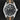 Brand new Tudor Ranger 39mm M79950-0003 black dial watch with olive green striped fabric strap, available at Lone Star Timepieces Dallas