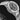 left non-crown profile view of the Ulysse Nardin Diver X case showcasing the sandblasted titanium finish and white bezel profile